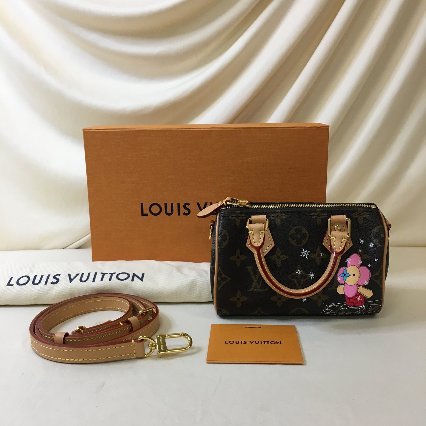 Louis Vuitton Monogram Vivienne Nano Speedy Bandouliere Sku# 66402